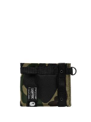 A BATHING APE® camouflage-print bi-fold wallet