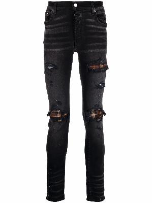 AMIRI ripped-finish skinny jeans