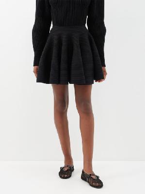 Alaïa - Ribbed Wool-blend Mini Skirt - Womens - Black - 34 FR