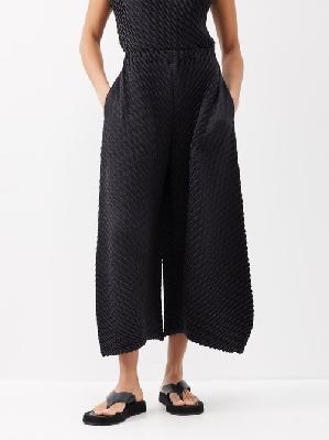 Issey Miyake - Gleam Pleats Technical-pleated Wide-leg Trousers - Womens - Black - ONE SIZE
