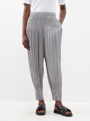 Pleats Please Issey Miyake - Tapered Technical-pleated Trousers - Womens - Light Grey - 2
