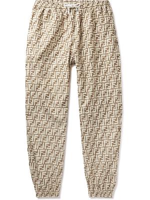 Fendi - Tapered Logo-Print Shell Drawstring Trousers