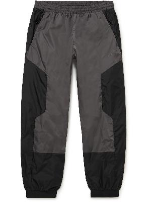 Moncler - Tapered Panelled Shell Trousers